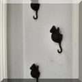 D17. Mouse-shaped wall hooks. 